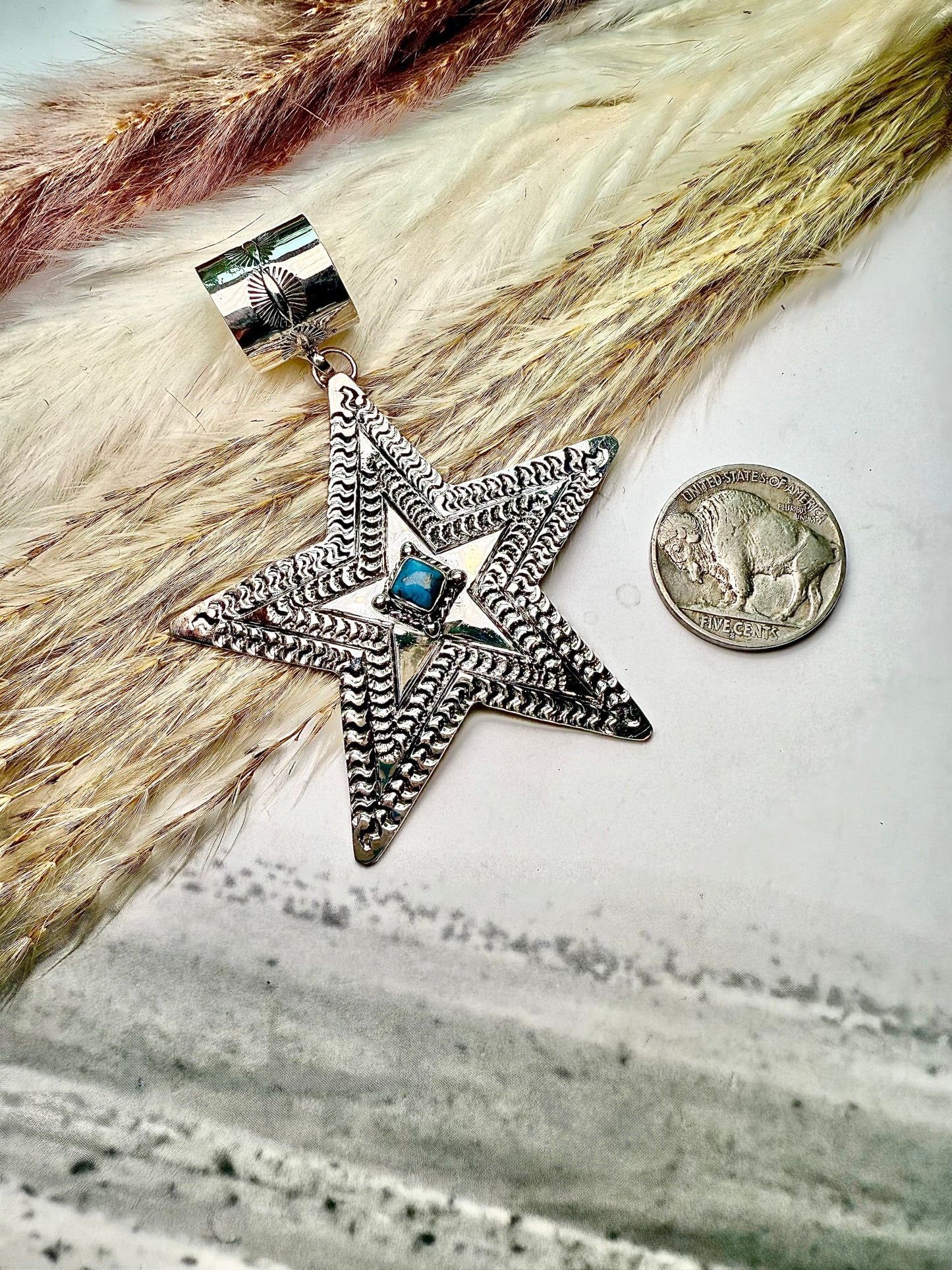 Sterling Silver Star Pendant by June Delgarito