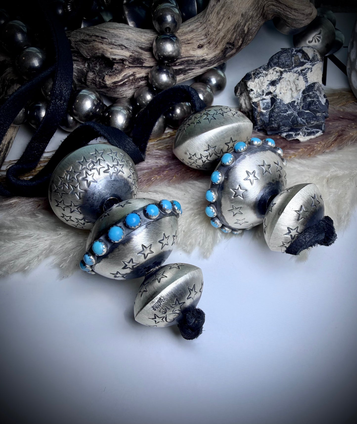 Six Monica Smith Saucers with Stars and Turquoise on Black Leather