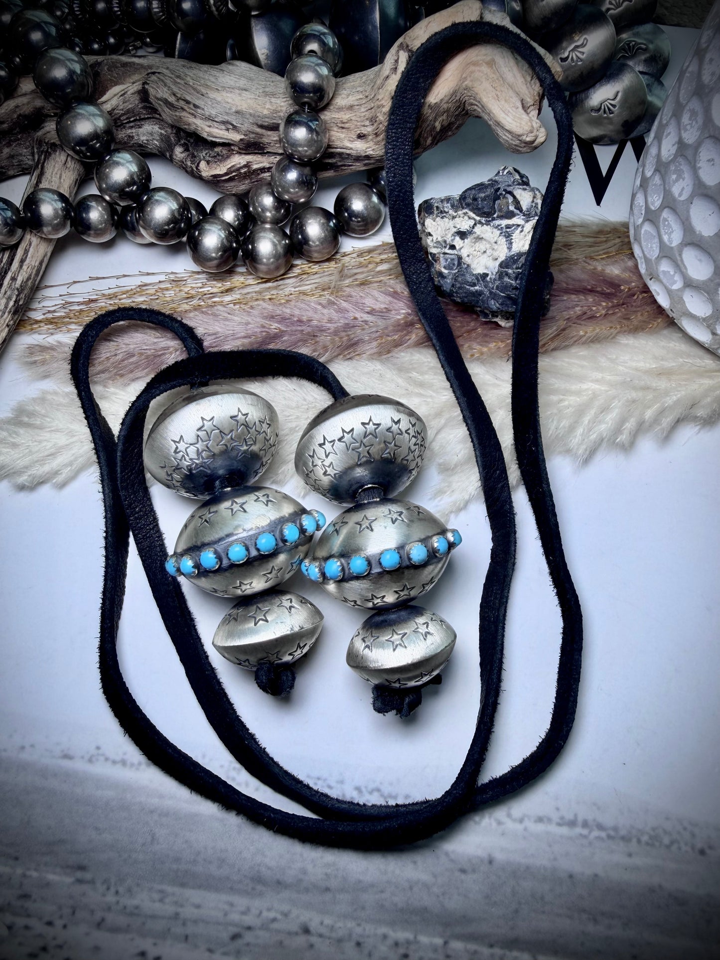 Six Monica Smith Saucers with Stars and Turquoise on Black Leather