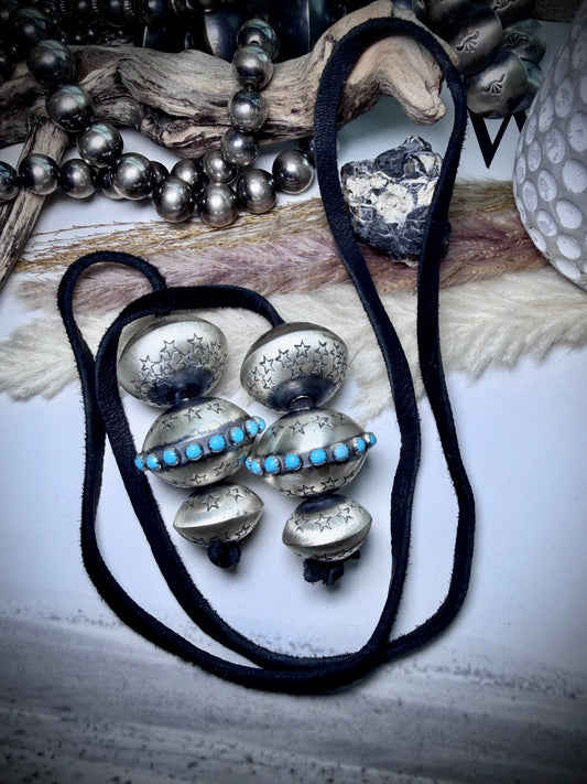 Six Monica Smith Saucers with Stars and Turquoise on Black Leather