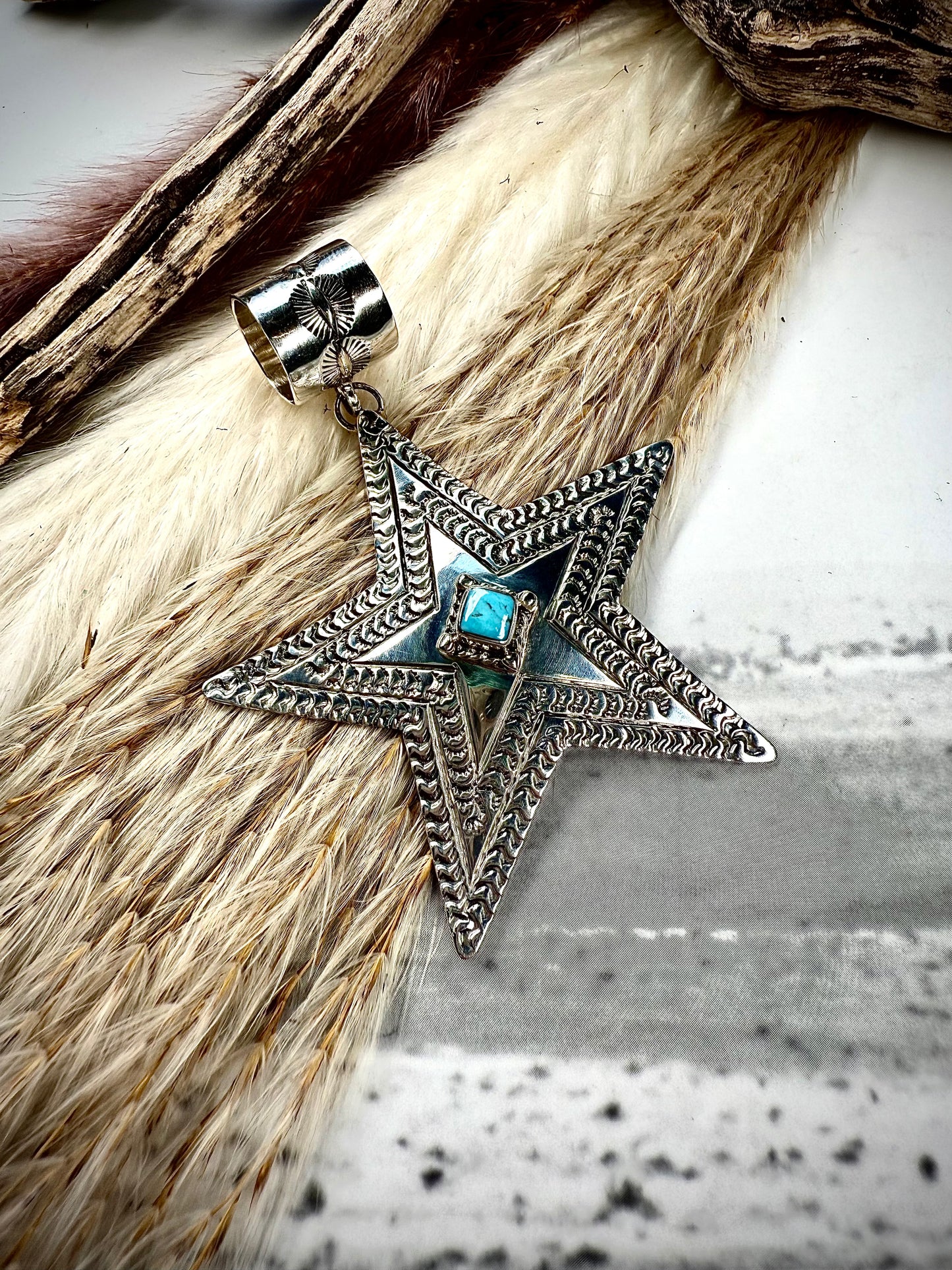 Sterling Silver Star Pendant by June Delgarito