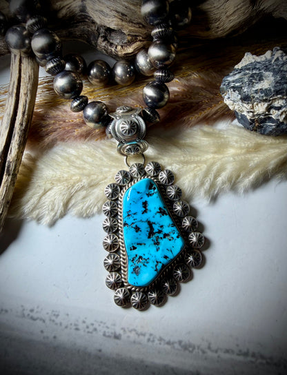 Sleeping Beauty pendant by M Spencer