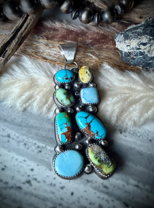 Multi-Stone Pendant by Delbert Secatero.